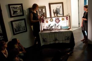 Katherine performing one of her crankies at the opening of her paper cut and shadow puppet exhibit at The Creative Alliance in Baltimore, with Anna Roberts Gevalt and Elizabeth Laprelle. 